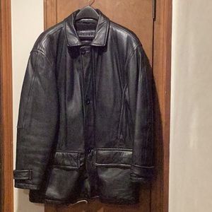 XL men’s black leather jacket with zip in lining making it a year round jacket.